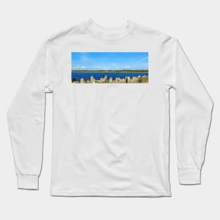 People fishing with a line on an old stone pier on a clear day Long Sleeve T-Shirt